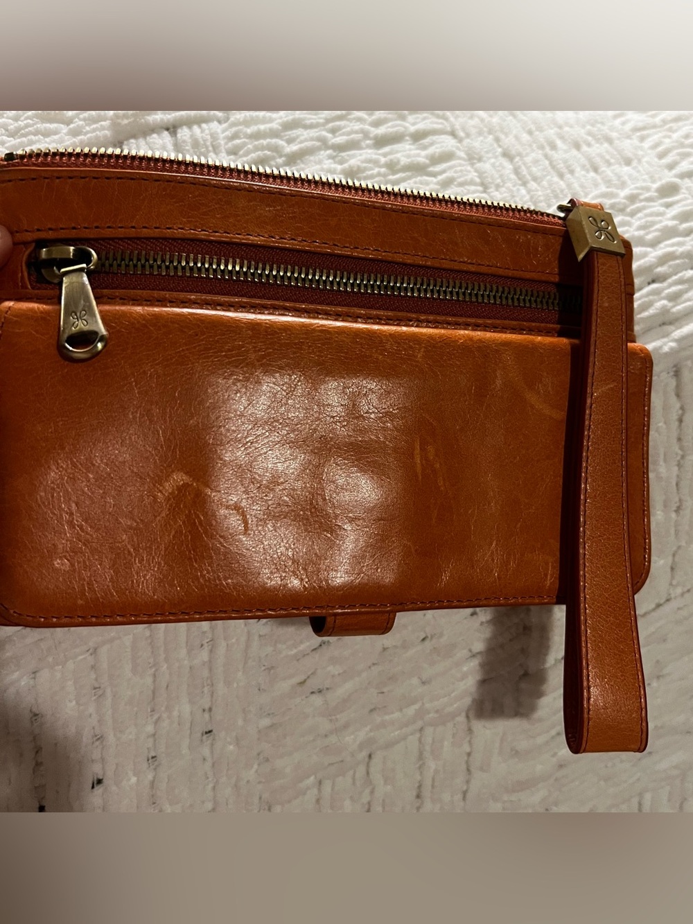 HOBO Leather Wristlet Wallet in Coral peach. 7 1/2x5